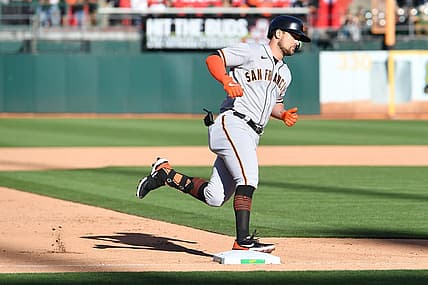 Aug 6, 2022; Oakland, California, USA; San Francisco Giants designated hitter J.D. Davis (7) rounds third base after hitting a solo home run against the Oakland Athletics during the sixth inning at RingCentral Coliseum. Mandatory Credit: Robert Edwards-USA TODAY Sports