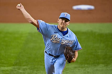 Aug 7, 2022; Arlington, Texas, USA; Texas Rangers starting pitcher Spencer Howard (31) pitches against the Chicago White Sox during the first inning at Globe Life Field. Mandatory Credit: Jerome Miron-USA TODAY Sports