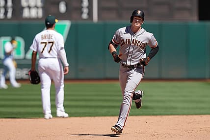 Aug 7, 2022; Oakland, California, USA; San Francisco Giants center fielder Mike Yastrzemski (5) rounds the bases after hitting a home run against the Oakland Athletics during the eighth inning at RingCentral Coliseum. Mandatory Credit: Darren Yamashita-USA TODAY Sports
