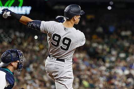 Aug 8, 2022; Seattle, Washington, USA; New York Yankees right fielder Aaron Judge (99) hits a solo-home run against the Seattle Mariners during the ninth inning at T-Mobile Park. Mandatory Credit: Joe Nicholson-USA TODAY Sports
