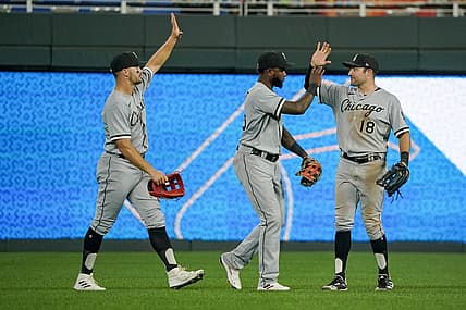 Aug 9, 2022; Kansas City, Missouri, USA; Chicago White Sox center fielder Adam Engel (15) and right fielder AJ Pollock (18) and center fielder Luis Robert (88) celebrate against the Kansas City Royals after a game at Kauffman Stadium. Mandatory Credit: Denny Medley-USA TODAY Sports