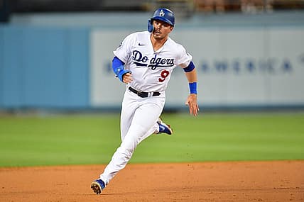 Aug 9, 2022; Los Angeles, California, USA; Los Angeles Dodgers second baseman Gavin Lux (9) runs to third against the Minnesota Twins during the second inning at Dodger Stadium. Mandatory Credit: Gary A. Vasquez-USA TODAY Sports