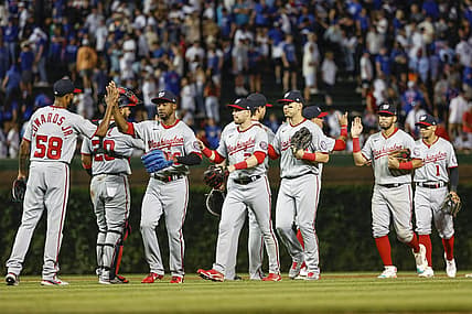 Aug 9, 2022; Chicago, Illinois, USA; Washington Nationals players celebrate after defeating the Chicago Cubs at Wrigley Field. Mandatory Credit: Kamil Krzaczynski-USA TODAY Sports