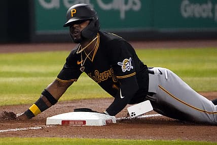 Aug 9, 2022; Phoenix, Arizona, USA; Pittsburgh Pirates second baseman Rodolfo Castro (14) loses his iPhone mobile cell phone as he slides into third base against the Arizona Diamondbacks during the fourth inning at Chase Field. Mandatory Credit: Joe Camporeale-USA TODAY Sports