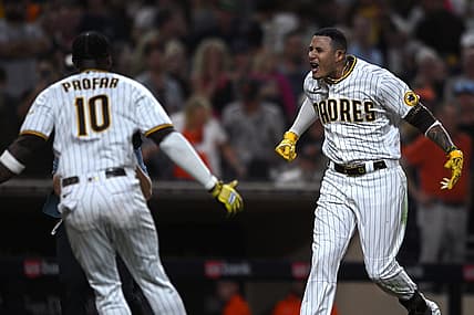 Aug 9, 2022; San Diego, California, USA; San Diego Padres third baseman Manny Machado (right) celebrates with left fielder Jurickson Profar (10) after hitting a walk-off three-run home run against the San Francisco Giants at Petco Park. Mandatory Credit: Orlando Ramirez-USA TODAY Sports