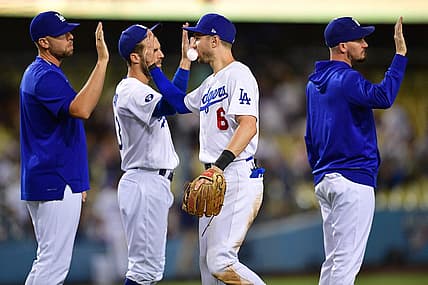 Aug 9, 2022; Los Angeles, California, USA; Los Angeles Dodgers shortstop Trea Turner (6) celebrates the victory against the Minnesota Twins at Dodger Stadium. Mandatory Credit: Gary A. Vasquez-USA TODAY Sports