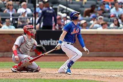 Aug 10, 2022; New York City, New York, USA; New York Mets right fielder Tyler Naquin (25) follows through on a solo home run against the Cincinnati Reds during the third inning at Citi Field. Mandatory Credit: Brad Penner-USA TODAY Sports