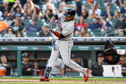 Aug 10, 2022; Detroit, Michigan, USA; Cleveland Guardians third baseman Jose Ramirez (11) hits a RBI single off Detroit Tigers starting pitcher Drew Hutchison (not pictured) in the first inning at Comerica Park. Mandatory Credit: Lon Horwedel-USA TODAY Sports