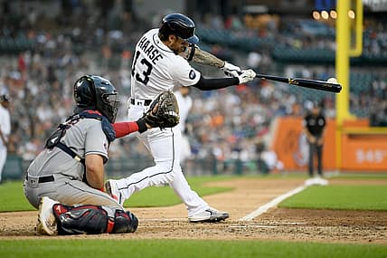 Aug 10, 2022; Detroit, Michigan, USA; Detroit Tigers catcher Eric Haase (13) hits an RBI double off Cleveland Guardians starting pitcher Aaron Civale (not pictured) in the fourth inning at Comerica Park. Mandatory Credit: Lon Horwedel-USA TODAY Sports
