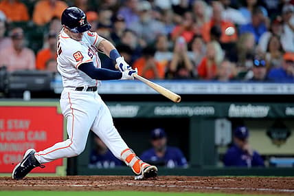 Aug 11, 2022; Houston, Texas, USA; Houston Astros third baseman Alex Bregman (2) hits a two-run home run against the Texas Rangers during the fifth inning at Minute Maid Park. Mandatory Credit: Erik Williams-USA TODAY Sports