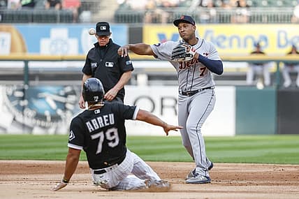 Aug 12, 2022; Chicago, Illinois, USA; Detroit Tigers second baseman Jonathan Schoop (7) throws out Chicago White Sox first baseman Jose Abreu (79) at the second base during the second inning at Guaranteed Rate Field. Mandatory Credit: Kamil Krzaczynski-USA TODAY Sports