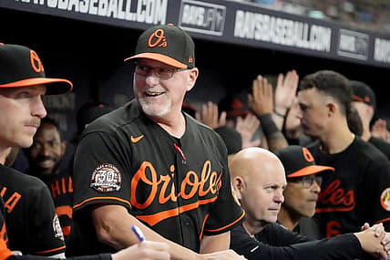 Aug 12, 2022; St. Petersburg, Florida, USA; Baltimore Orioles manager Brandon Hyde (18) reacts after his team scored in the sixth inning against the Tampa Bay Rays  at Tropicana Field. Mandatory Credit: Dave Nelson-USA TODAY Sports