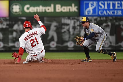 Aug 12, 2022; St. Louis, Missouri, USA; St. Louis Cardinals right fielder Lars Nootbaar (21) steals second base ahead of Milwaukee Brewers second baseman Luis Urias (2) in the fifth inning at Busch Stadium. Mandatory Credit: Joe Puetz-USA TODAY Sports