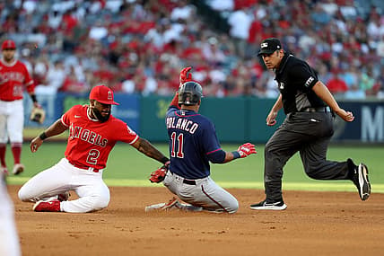 Aug 13, 2022; Anaheim, California, USA;  Minnesota Twins second baseman Jorge Polanco (11) tagged out by Los Angeles Angels second baseman Luis Rengifo (2) at second during the fourth inning at Angel Stadium. Mandatory Credit: Kiyoshi Mio-USA TODAY Sports