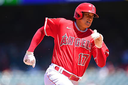 Aug 14, 2022; Anaheim, California, USA; Los Angeles Angels designated hitter Shohei Ohtani (17) runs home to score against the Minnesota Twins during the third inning at Angel Stadium. Mandatory Credit: Gary A. Vasquez-USA TODAY Sports