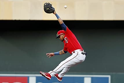 Aug 15, 2022; Minneapolis, Minnesota, USA; Minnesota Twins first baseman Luis Arraez (2) misses a single by Kansas City Royals catcher Salvador Perez (not pictured) in the first inning at Target Field. Mandatory Credit: Bruce Kluckhohn-USA TODAY Sports