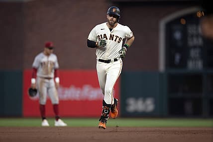 Aug 15, 2022; San Francisco, California, USA; San Francisco Giants third baseman Evan Longoria rounds the bases after a two-run home run off Arizona Diamondbacks starting pitcher Madison Bumgarner during the fourth inning at Oracle Park. Mandatory Credit: D. Ross Cameron-USA TODAY Sports