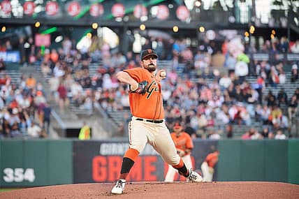 Aug 12, 2022; San Francisco, California, USA; San Francisco Giants starting pitcher Carlos Rodon (16) throws a pitch against the Pittsburgh Pirates during the first inning at Oracle Park. Mandatory Credit: Robert Edwards-USA TODAY Sports