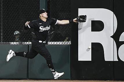 Aug 16, 2022; Chicago, Illinois, USA; Chicago White Sox right fielder Andrew Vaughn (25) tries to make a play on the ball hit by Houston Astros first baseman Yuli Gurriel (not pictured) during the third inning at Guaranteed Rate Field. Mandatory Credit: Matt Marton-USA TODAY Sports
