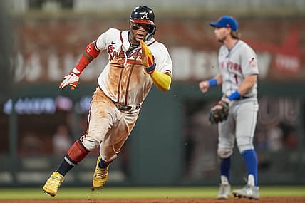 Aug 16, 2022; Cumberland, Georgia, USA; Atlanta Braves right fielder Ronald Acuna Jr. (13) runs before scoring a run against the New York Mets during the seventh inning at Truist Park. Mandatory Credit: Dale Zanine-USA TODAY Sports