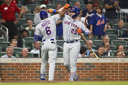 Aug 17, 2022; Atlanta, Georgia, USA; New York Mets right fielder Starling Marte (6) celebrates with first baseman Pete Alonso (20) after Marte s home run against the Atlanta Braves in the seventh inning at Truist Park. Mandatory Credit: Brett Davis-USA TODAY Sports