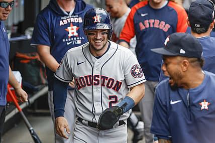 Aug 18, 2022; Chicago, Illinois, USA; Houston Astros third baseman Alex Bregman (2) celebrates in the dugout after scoring against the Chicago White Sox during the third inning at Guaranteed Rate Field. Mandatory Credit: Kamil Krzaczynski-USA TODAY Sports