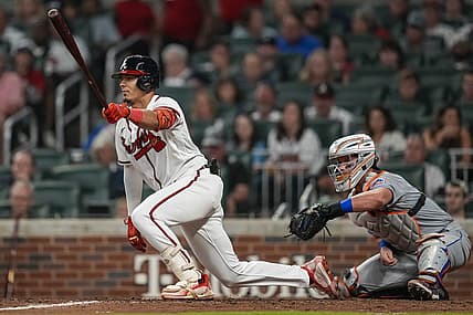 Aug 18, 2022; Cumberland, Georgia, USA; Atlanta Braves second baseman Vaughn Grissom (18) hits an infield single against the New York Mets during the seventh inning at Truist Park. Mandatory Credit: Dale Zanine-USA TODAY Sports