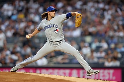 Aug 19, 2022; Bronx, New York, USA; Toronto Blue Jays starting pitcher Kevin Gausman (34) pitches against the New York Yankees during the first inning at Yankee Stadium. Mandatory Credit: Brad Penner-USA TODAY Sports