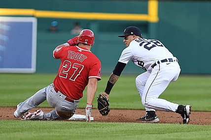 Aug 19, 2022; Detroit, Michigan, USA; Los Angeles Angels center fielder Mike Trout (27) is tagged out at second base by Detroit Tigers shortstop Javier Baez (28) to end the third inning on a fielder's choice at Comerica Park. Mandatory Credit: Lon Horwedel-USA TODAY Sports