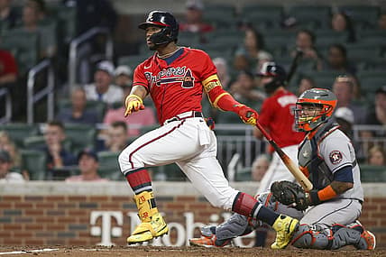 Aug 19, 2022; Atlanta, Georgia, USA; Atlanta Braves right fielder Ronald Acuna Jr. (13) hits a single against the Houston Astros in the fourth inning at Truist Park. Mandatory Credit: Brett Davis-USA TODAY Sports