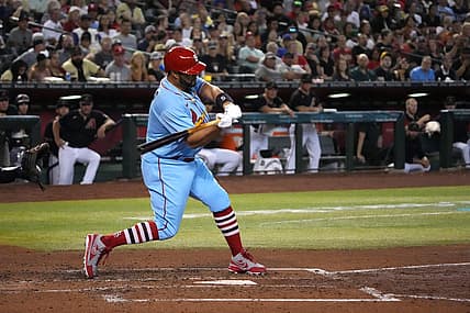 Aug 20, 2022; Phoenix, Arizona, USA; St. Louis Cardinals designated hitter Albert Pujols (5) hits a solo home run against the Arizona Diamondbacks during the fourth inning at Chase Field. Mandatory Credit: Joe Camporeale-USA TODAY Sports