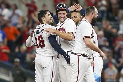 Aug 20, 2022; Atlanta, Georgia, USA; Atlanta Braves pinch hitter Travis d'Arnaud (16) celebrates after a walk-off single with first baseman Matt Olson (28) against the Houston Astros in the eleventh inning at Truist Park. Mandatory Credit: Brett Davis-USA TODAY Sports