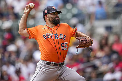 Aug 21, 2022; Cumberland, Georgia, USA; Houston Astros starting pitcher Jose Urquidy (65) pitches against the Atlanta Braves during the first inning at Truist Park. Mandatory Credit: Dale Zanine-USA TODAY Sports