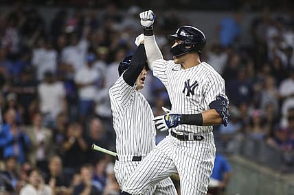 Aug 22, 2022; Bronx, New York, USA;  New York Yankees right fielder Aaron Judge (99) celebrates with first baseman Anthony Rizzo (48) after hitting a home run in the third inning against the New York Mets at Yankee Stadium. Mandatory Credit: Wendell Cruz-USA TODAY Sports