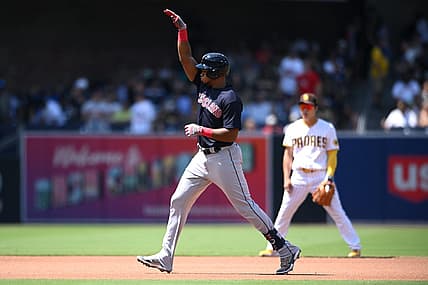 Aug 24, 2022; San Diego, California, USA; Cleveland Guardians right fielder Oscar Gonzalez (left) gestures while rounding the bases after hitting a home run against the San Diego Padres during the fourth inning at Petco Park. Mandatory Credit: Orlando Ramirez-USA TODAY Sports