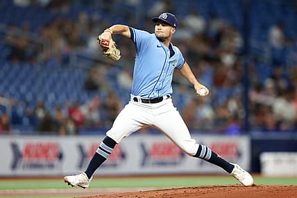 Aug 24, 2022; St. Petersburg, Florida, USA;  Tampa Bay Rays starting pitcher Shane McClanahan (18) throws a pitch against the Los Angeles Angels in the first inning at Tropicana Field. Mandatory Credit: Nathan Ray Seebeck-USA TODAY Sports