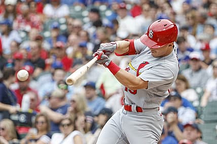 Aug 25, 2022; Chicago, Illinois, USA; St. Louis Cardinals second baseman Tommy Edman (19) singles against the Chicago Cubs during the first inning at Wrigley Field. Mandatory Credit: Kamil Krzaczynski-USA TODAY Sports