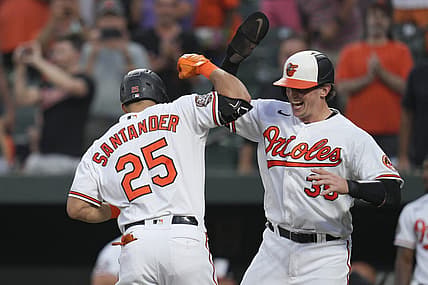 Aug 25, 2022; Baltimore, Maryland, USA;  Baltimore Orioles designated hitter Anthony Santander (25) celebrates a home run against the Chicago White Sox with catcher Adley Rutschman (35) during the first inning at Oriole Park at Camden Yards. Mandatory Credit: Jessica Rapfogel-USA TODAY Sports