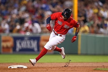 Aug 25, 2022; Boston, Massachusetts, USA; Boston Red Sox left fielder Tommy Pham (22) rounds second base during the third inning against the Toronto Blue Jays at Fenway Park. Mandatory Credit: Paul Rutherford-USA TODAY Sports