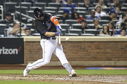 Aug 26, 2022; New York City, New York, USA; New York Mets first baseman Pete Alonso (20) hits a single in the fourth inning against the Colorado Rockies at Citi Field. Mandatory Credit: Wendell Cruz-USA TODAY Sports