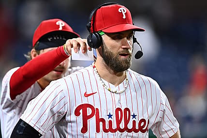 Aug 26, 2022; Philadelphia, Pennsylvania, USA; Philadelphia Phillies outfielder Bryce Harper (3) reacts as infielder Bryson Stott (5) dumps water after the game against the Pittsburgh Pirates at Citizens Bank Park. Mandatory Credit: Kyle Ross-USA TODAY Sports