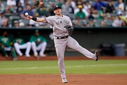 Aug 27, 2022; Oakland, California, USA; New York Yankees third baseman Josh Donaldson (28) throws to first to record an out against the Oakland Athletics in the fourth inning at RingCentral Coliseum. Mandatory Credit: Cary Edmondson-USA TODAY Sports