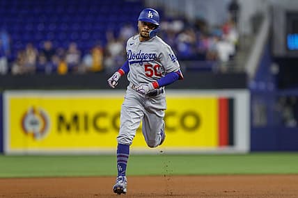 Aug 28, 2022; Miami, Florida, USA; Los Angeles Dodgers right fielder Mookie Betts (50) circles the bases after hitting a home run during the first inning against the Miami Marlins at loanDepot Park. Mandatory Credit: Sam Navarro-USA TODAY Sports
