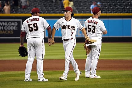 Aug 29, 2022; Phoenix, Arizona, USA; Arizona Diamondbacks right fielder Corbin Carroll (7) celebrates with teammates after defeating the Philadelphia Phillies at Chase Field. Mandatory Credit: Joe Camporeale-USA TODAY Sports