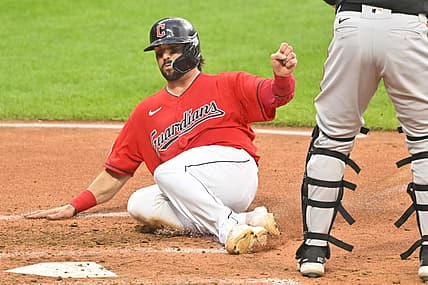 Aug 30, 2022; Cleveland, Ohio, USA; Cleveland Guardians catcher Austin Hedges (17) scores a run in the fifth inning against the Baltimore Orioles at Progressive Field. Mandatory Credit: David Richard-USA TODAY Sports