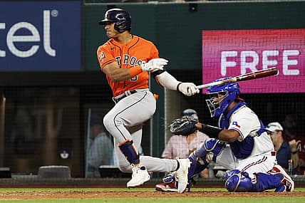 Aug 31, 2022; Arlington, Texas, USA; Houston Astros shortstop Jeremy Pena (3) follows thru on a single during the fourth inning against the Texas Rangers at Globe Life Field. Mandatory Credit: Raymond Carlin III-USA TODAY Sports