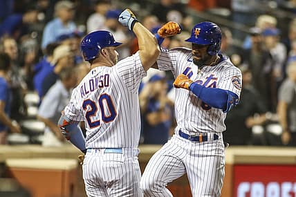 Aug 31, 2022; New York City, New York, USA; New York Mets right fielder Starling Marte (right) celebrates with first baseman Pete Alonso (20) after hitting a two-run home run in the third inning against the Los Angeles Dodgers at Citi Field. Mandatory Credit: Wendell Cruz-USA TODAY Sports
