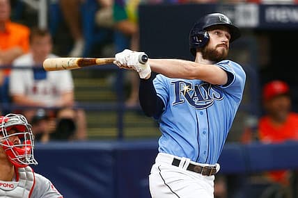 Jun 27, 2021; St. Petersburg, Florida, USA;  Tampa Bay Rays second baseman Brandon Lowe (8) hits a home run in the fifth inning during a game against the Los Angeles Angels at Tropicana Field. Mandatory Credit: Nathan Ray Seebeck-USA TODAY Sports