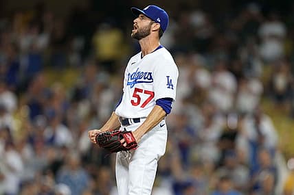Jul 10, 2021; Los Angeles, California, USA; Los Angeles Dodgers relief pitcher Jake Reed (57) celebrates after defeating the Arizona Diamondback sat Dodger Stadium. Mandatory Credit: Kirby Lee-USA TODAY Sports
