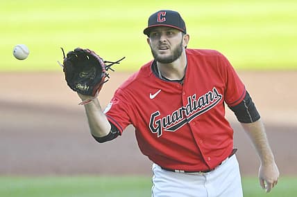 Jun 9, 2022; Cleveland, Ohio, USA; Cleveland Guardians starting pitcher Konnor Pilkington (45) catches a new ball after giving up a home run in the second inning against the Oakland Athletics at Progressive Field. Mandatory Credit: David Richard-USA TODAY Sports